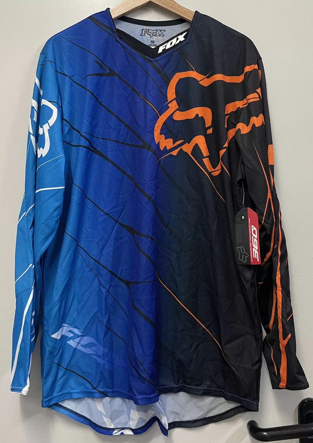 Maillot motocross Fox noir/orange/bleu T.M